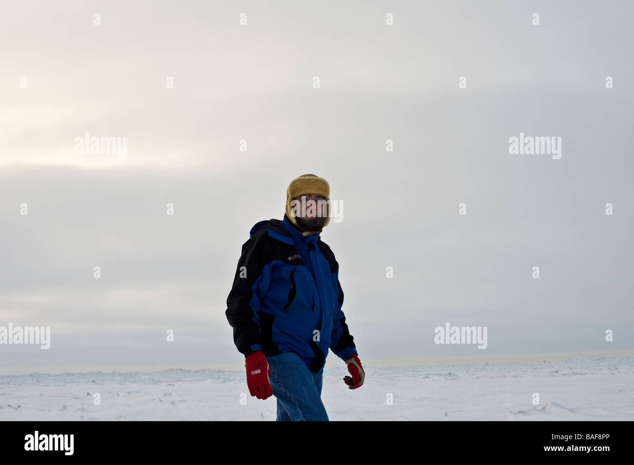 man dressed for cold alaska tundra winter snow Stock Photo