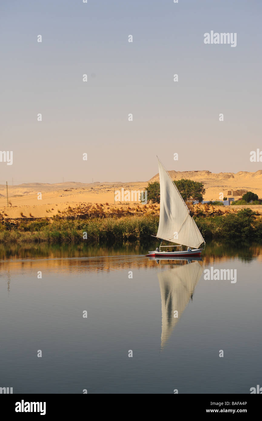 Africa Egypt A Felucca sailboat near the banks of the Nile River near ...