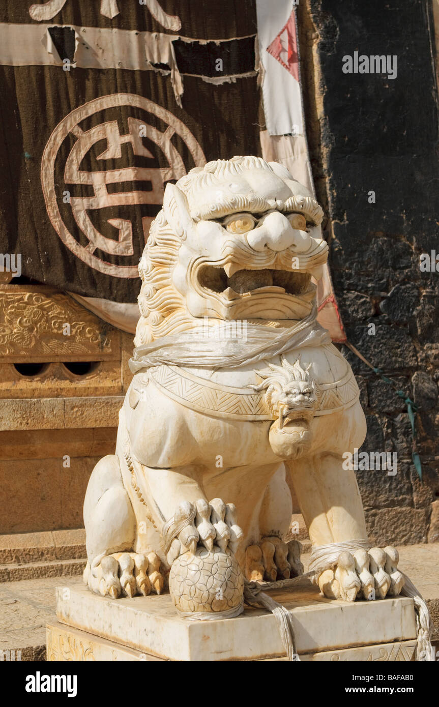 guardian lion in songzanlin tibetan monastery shangri la china Stock Photo