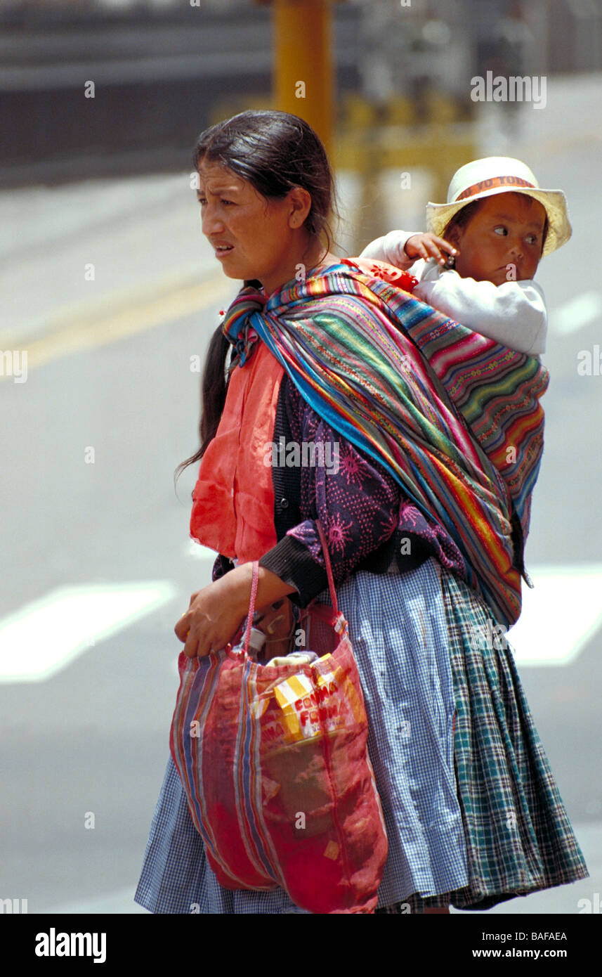 Peruvian Woman With Baby On Her Back Stock Photo Alamy