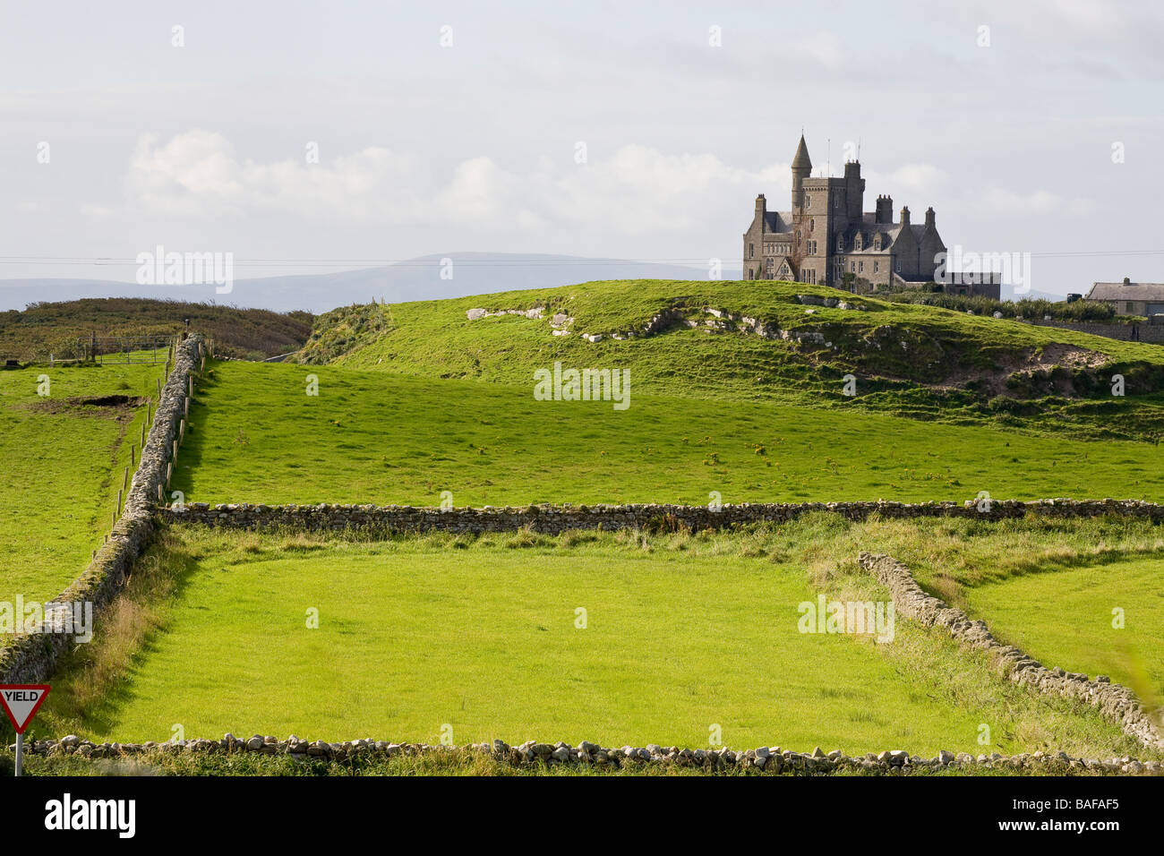 Classiebawn in the Pastures. Set in splendid isolation surrounded by bright green stone fenced pastures this 19th century house Stock Photo