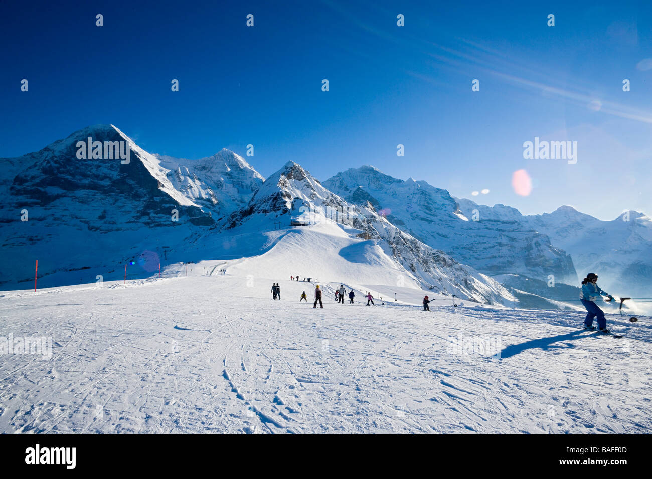 Ski school Eiger Moench and Jungfrau in background Maennlichen