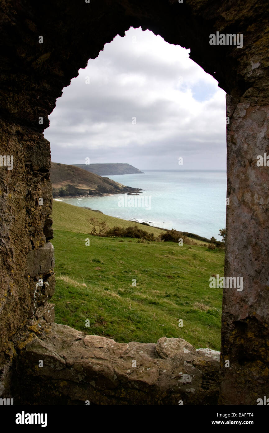 View through ruins along Cornish coast, England Stock Photo