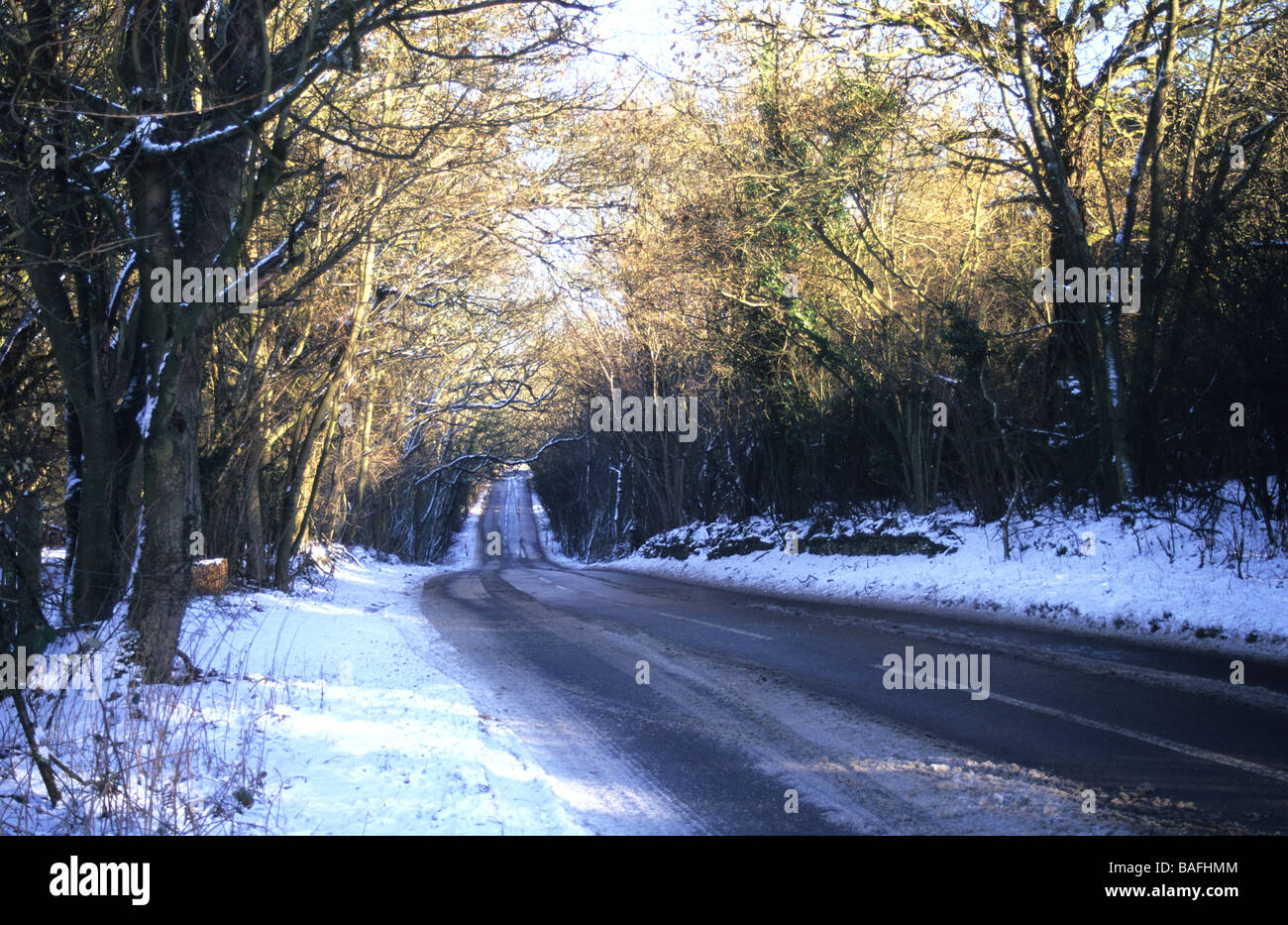 Road through the snow England Stock Photo