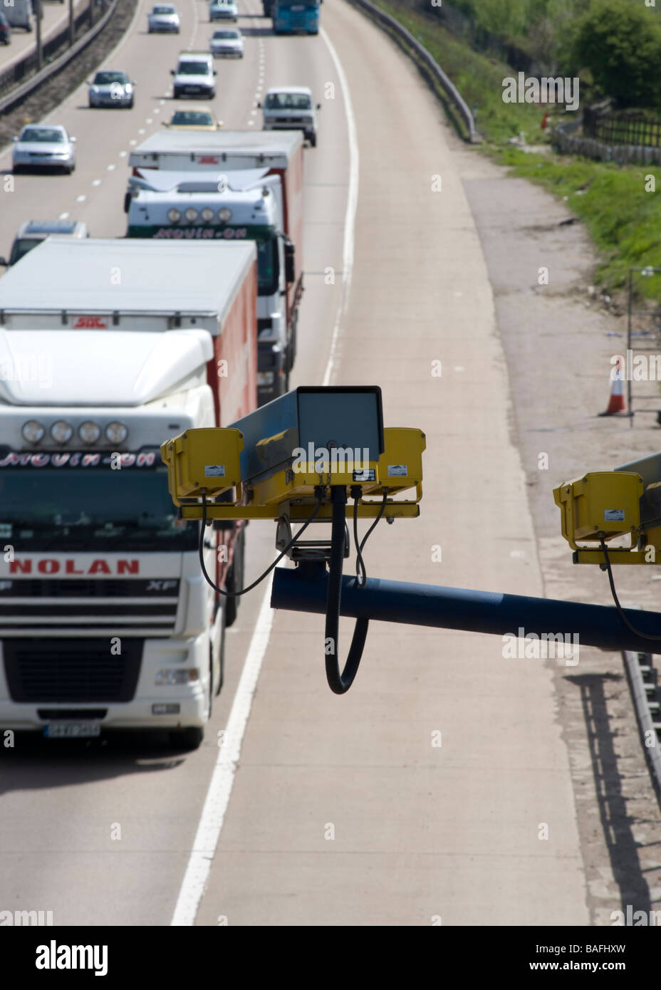 Traffic under surveillance as it passes through Essex on the M25. Stock Photo