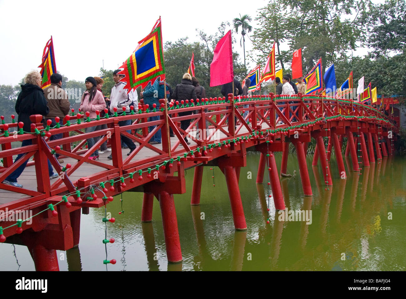 The Huc Bridge on Hoan Kiem Lake in Hanoi Vietnam Stock Photo