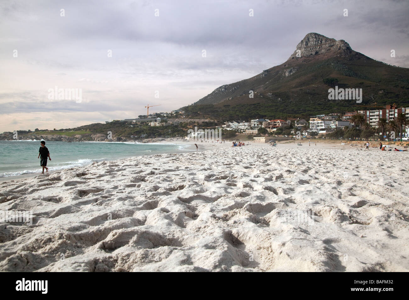 Boy playing in waves, Camps Bay, Cape Town, South Africa Stock Photo