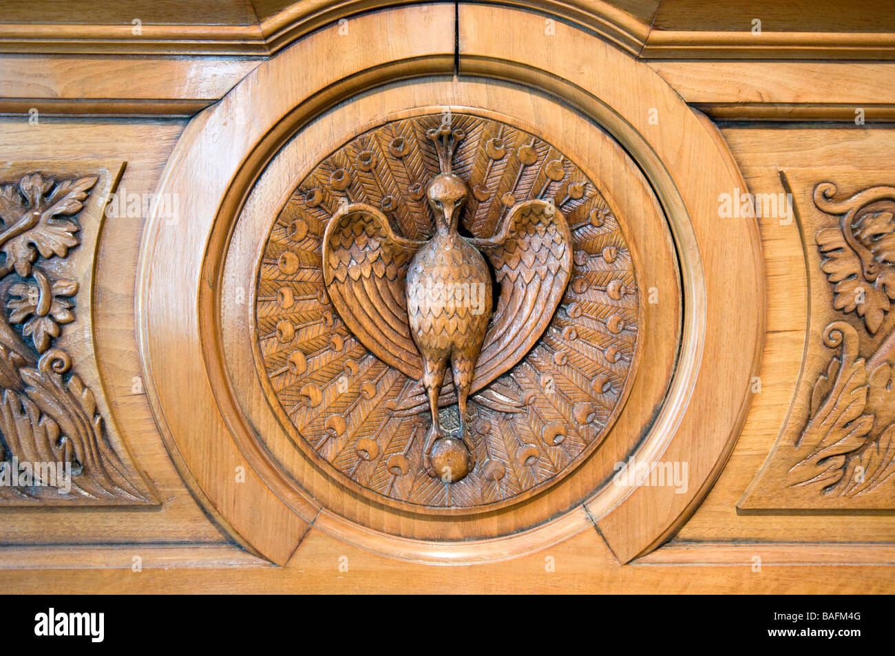 Wooden carving of Liverpool Liver Bird Crest Stock Photo