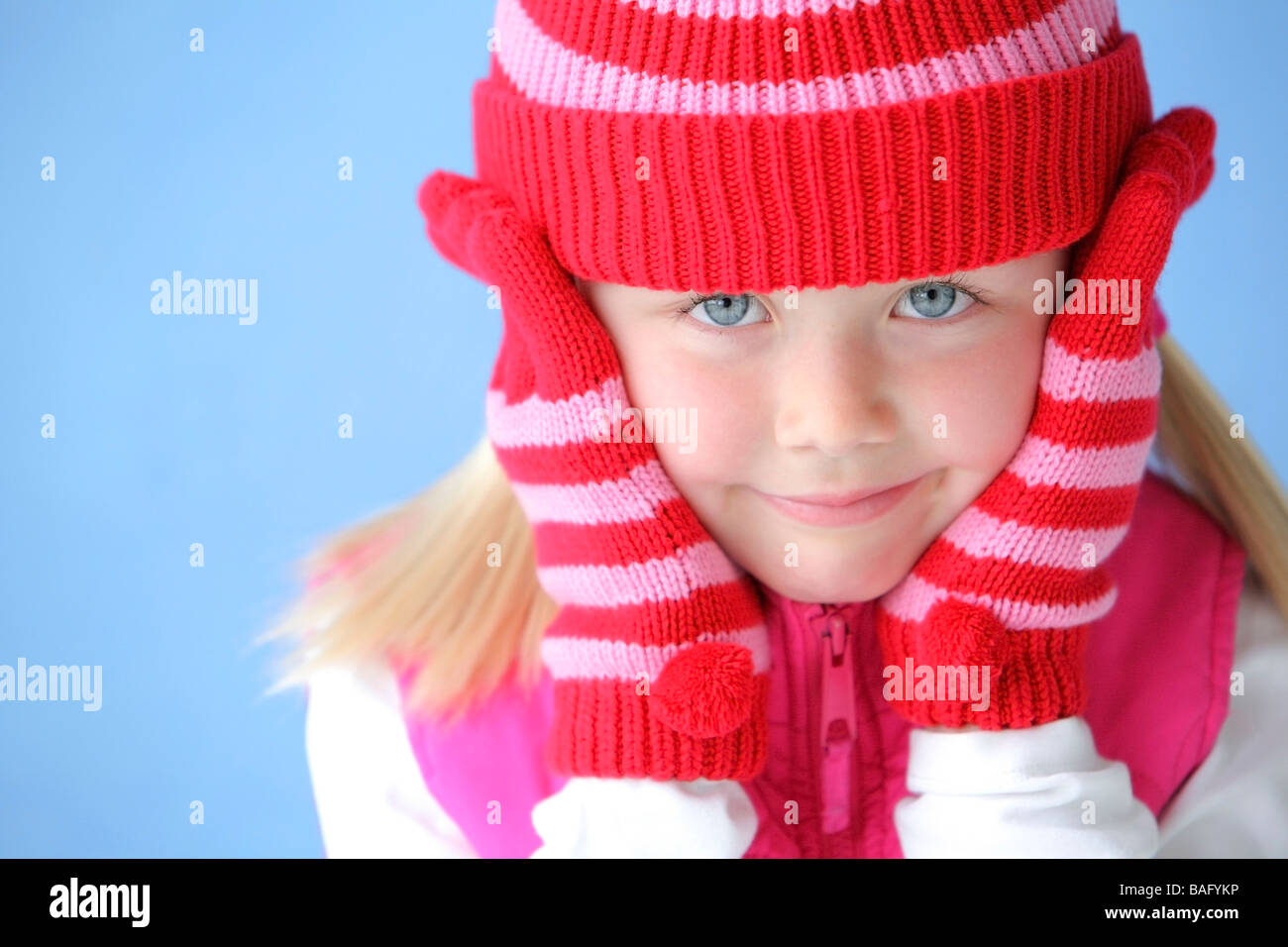 Child wearing hat and gloves Stock Photo Alamy