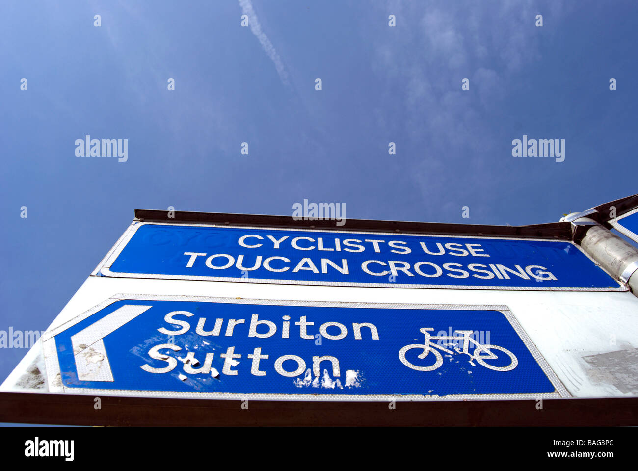 blue and white cyclists use toucan crossing sign and sign showing cycle ...