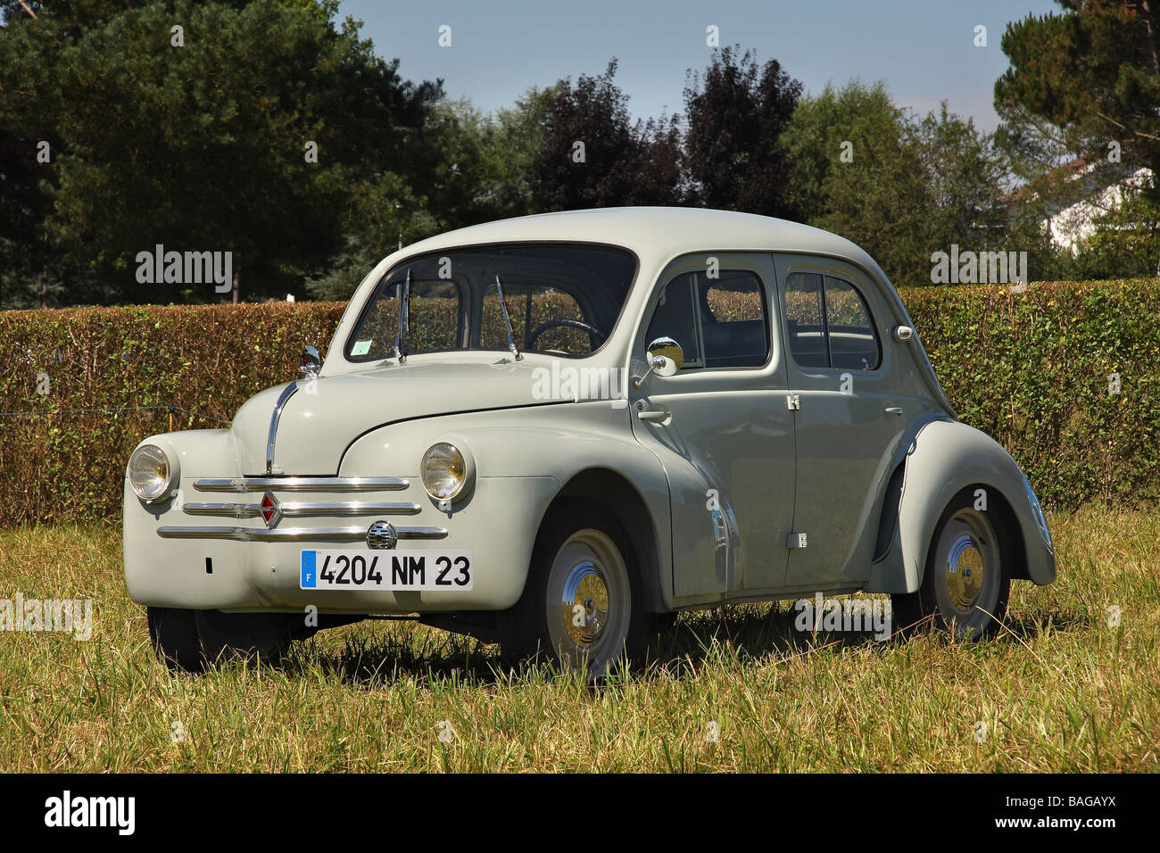 A well restored 1961 Renault 4cv modele affair in a field 747cc 3 speed Limousin France Stock Photo