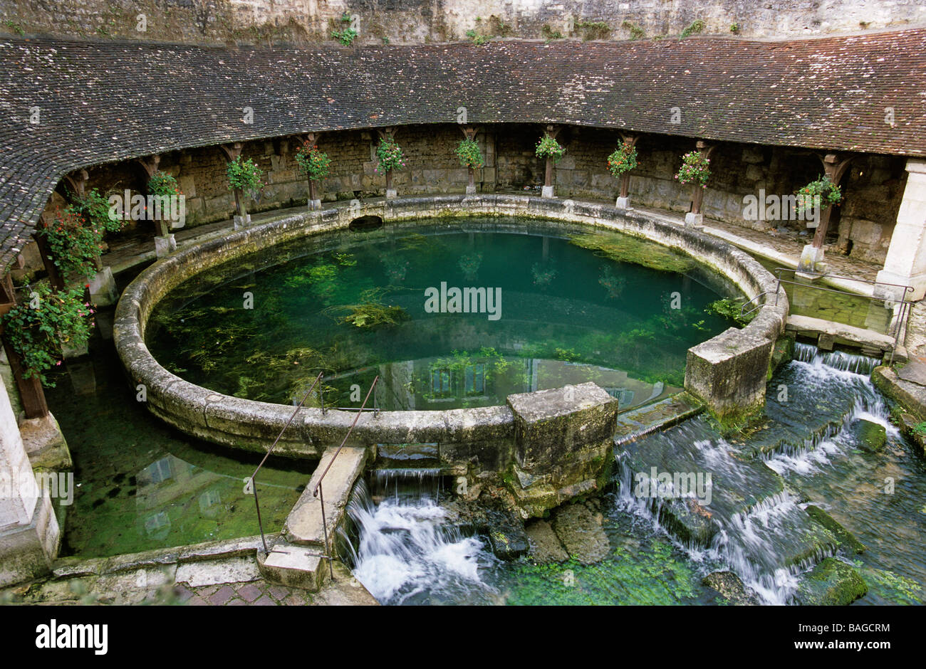 France, Yonne, Tonnerre, La Fosse Dionne, circular pool fed by a