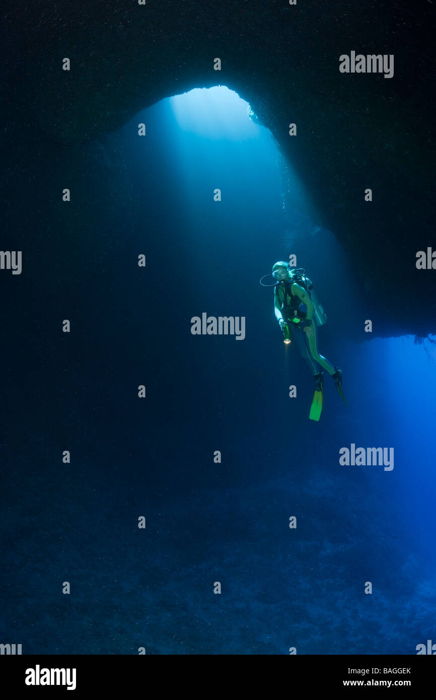 Diver in Blue Hole Cave Micronesia Palau Stock Photo