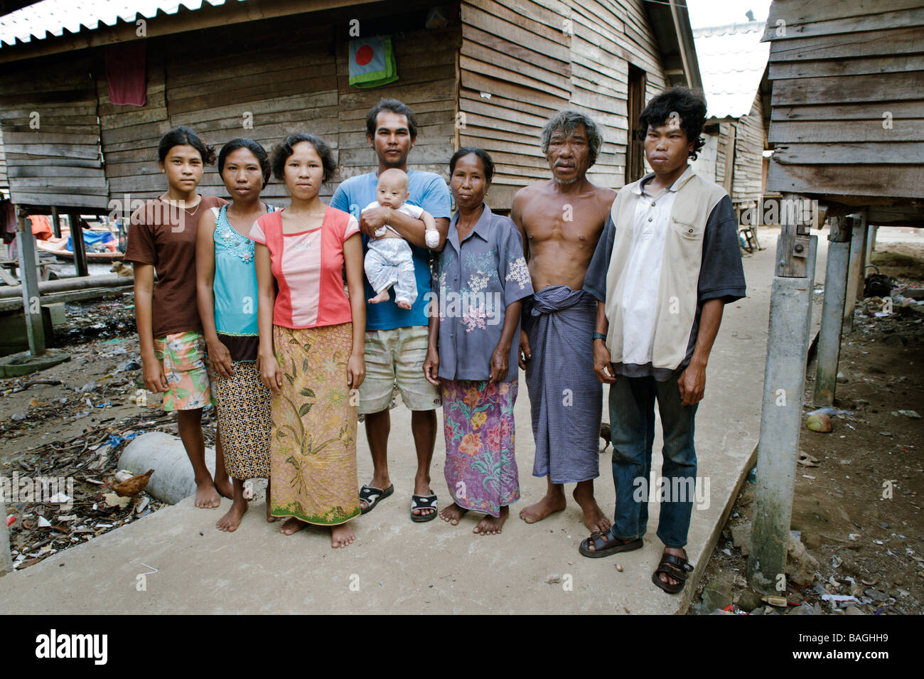 Moken sea gypsy family in a small island village off the coast of Stock