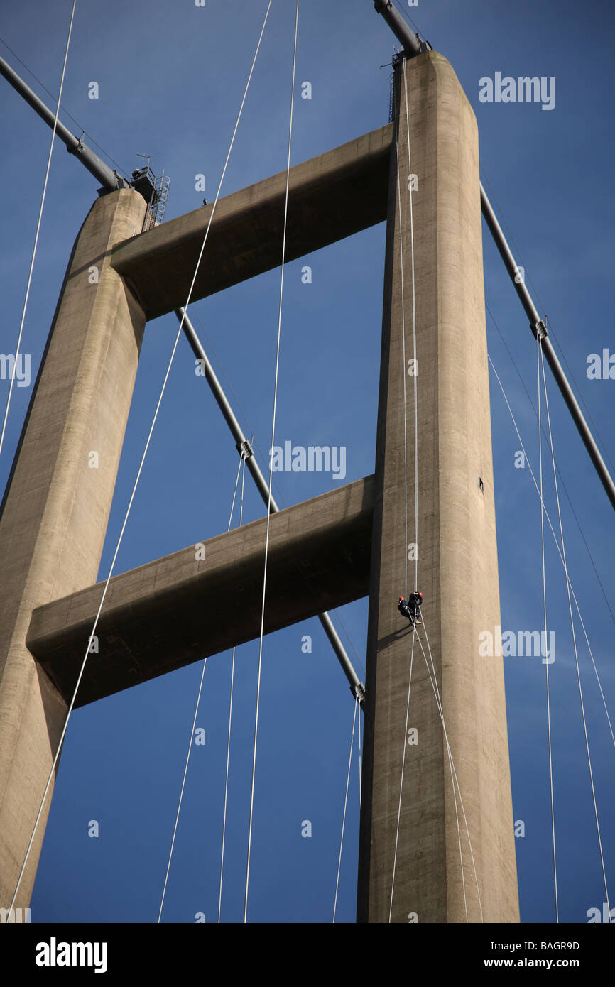 Two people rappelling off the Humber Bridge in Hull, England Stock ...