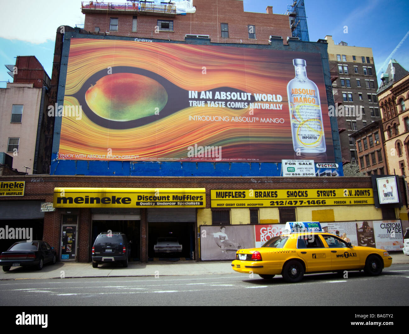 A billboard advertising Absolut Mango flavored vodka in the Noho neighborhood in New York Stock Photo