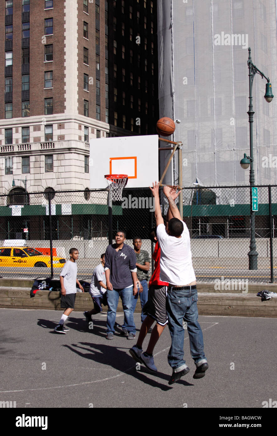 Youths playing basketball, New York City, USA Stock Photo Alamy