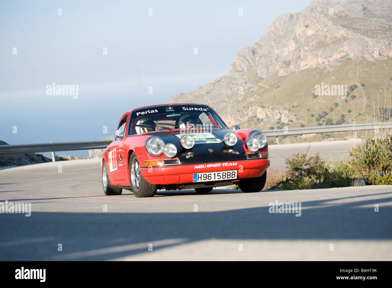 Red 1967 Porsche 911S classic sports car racing in the Mallorca classic car rally Stock Photo