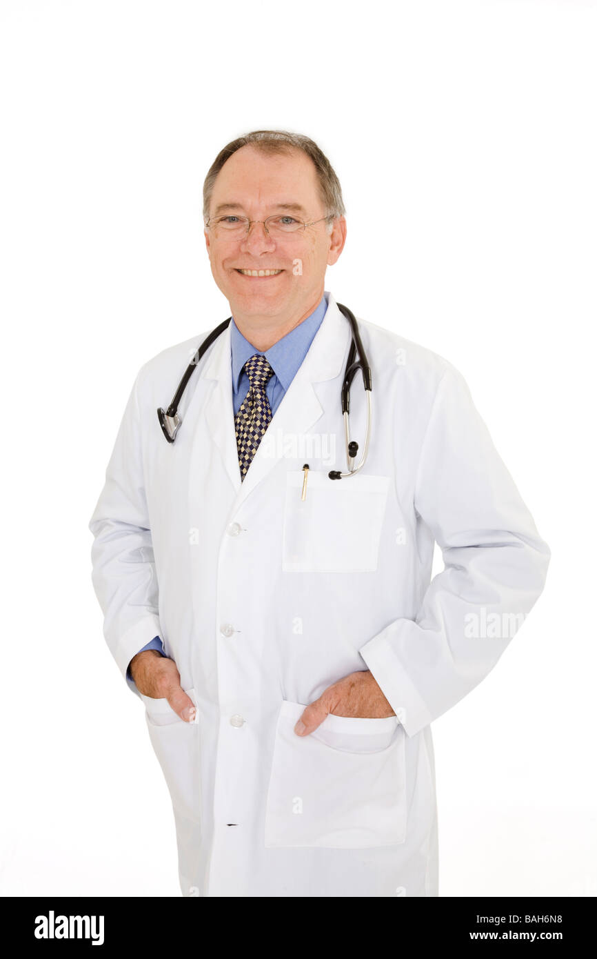 A caucasian doctor wearing a white lab coat standing on a white background Stock Photo