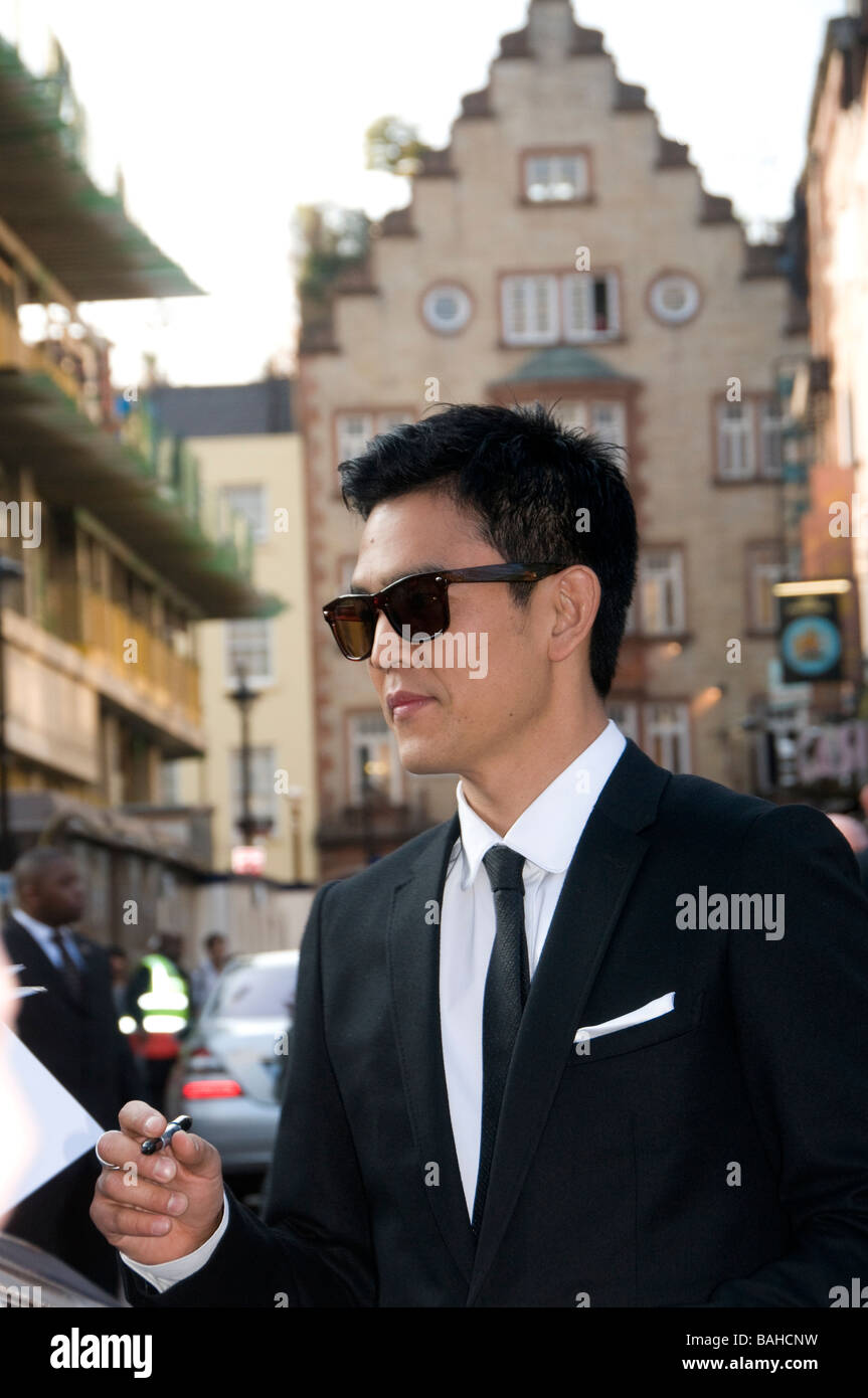 Actor John Cho signing autographs at the premiere of the new Star Trek movie, in Leicester square, London Stock Photo