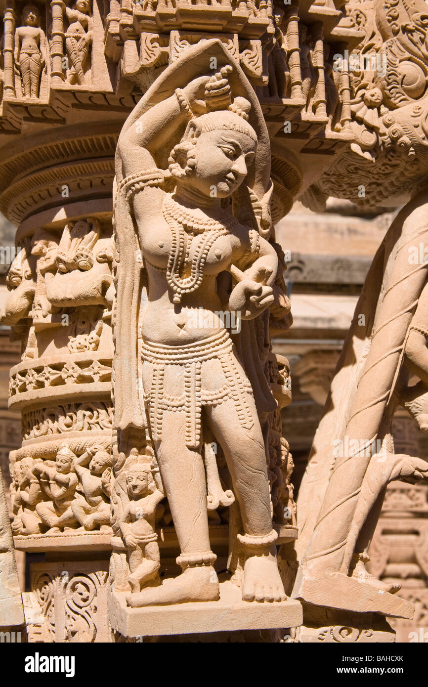 Stone carving of a woman, Mahavira Jain Temple, Osian, near Jodhpur, Rajasthan, India Stock Photo