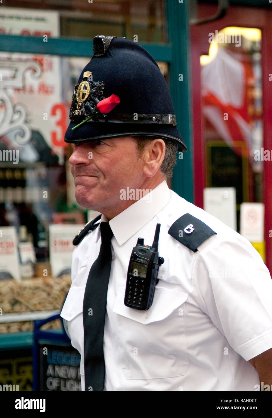 City Of London Policeman with St Geoges Day rose Stock Photo