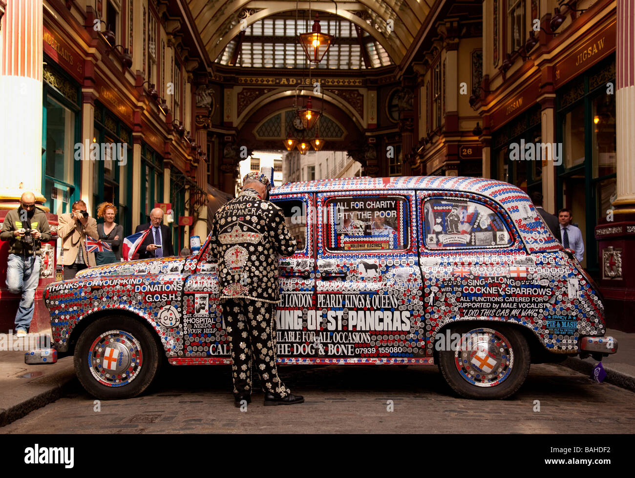 Pearly King of st Pancras London UK ith his London Taxi Stock Photo