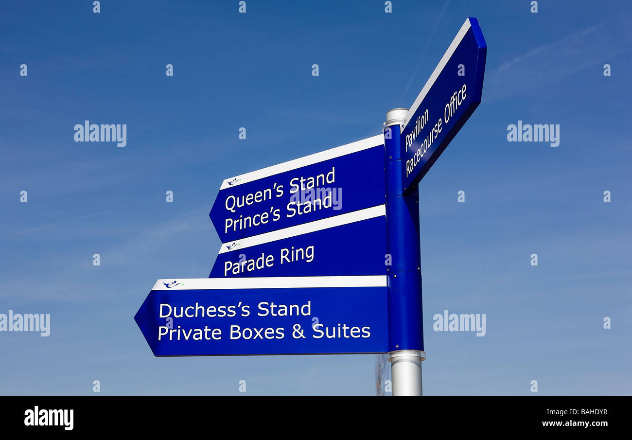 Direction post for the Queen's Stand the Duchess's Stand and Parade Ring at Epsom Down's Race Course in Surrey England Stock Photo