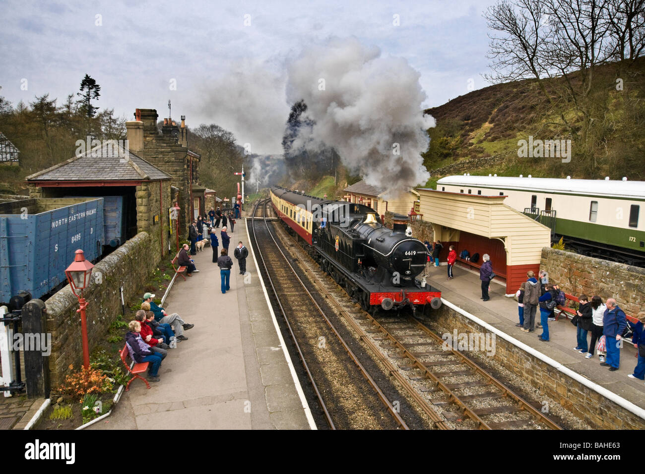 Steam train pulling in to Goathland station, North Yorkshire Moors Railway Stock Photo