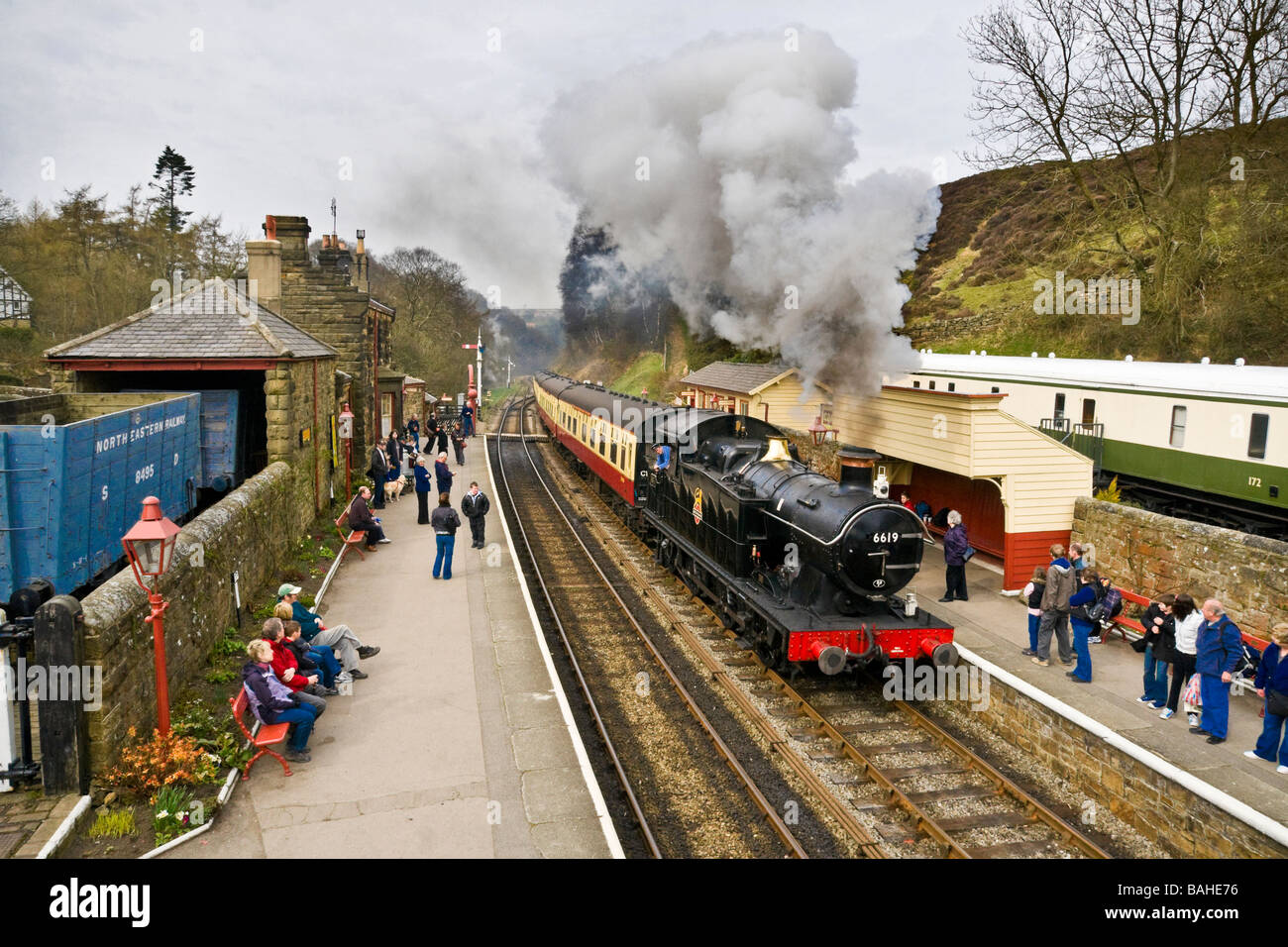 Steam train pulling in to Goathland station, North Yorkshire Moors Railway Stock Photo