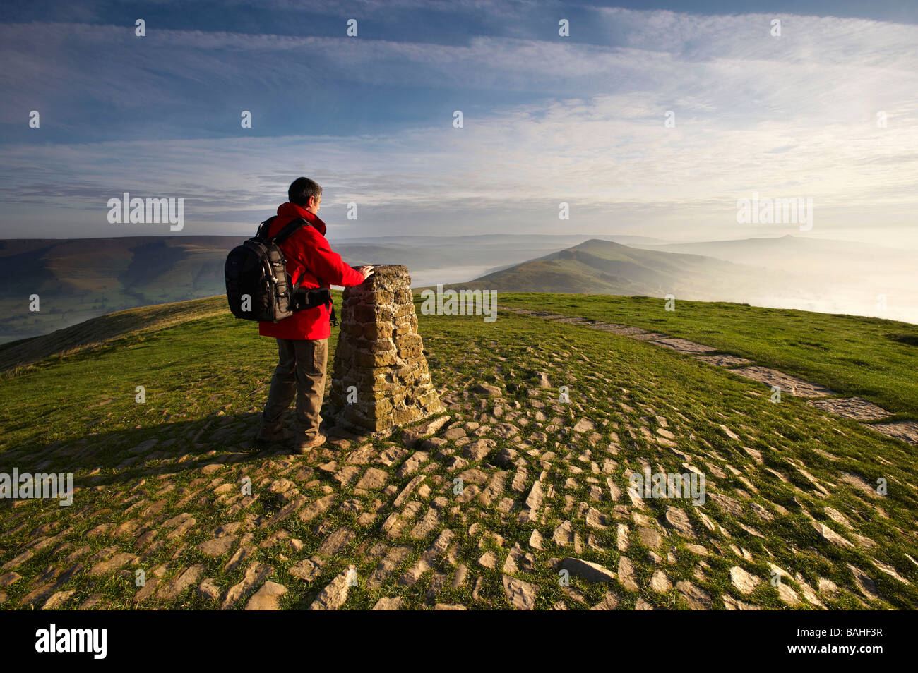 A walker at Mam Tor, Edale Valley, Peak District National Park, Derbyshire UK Stock Photo
