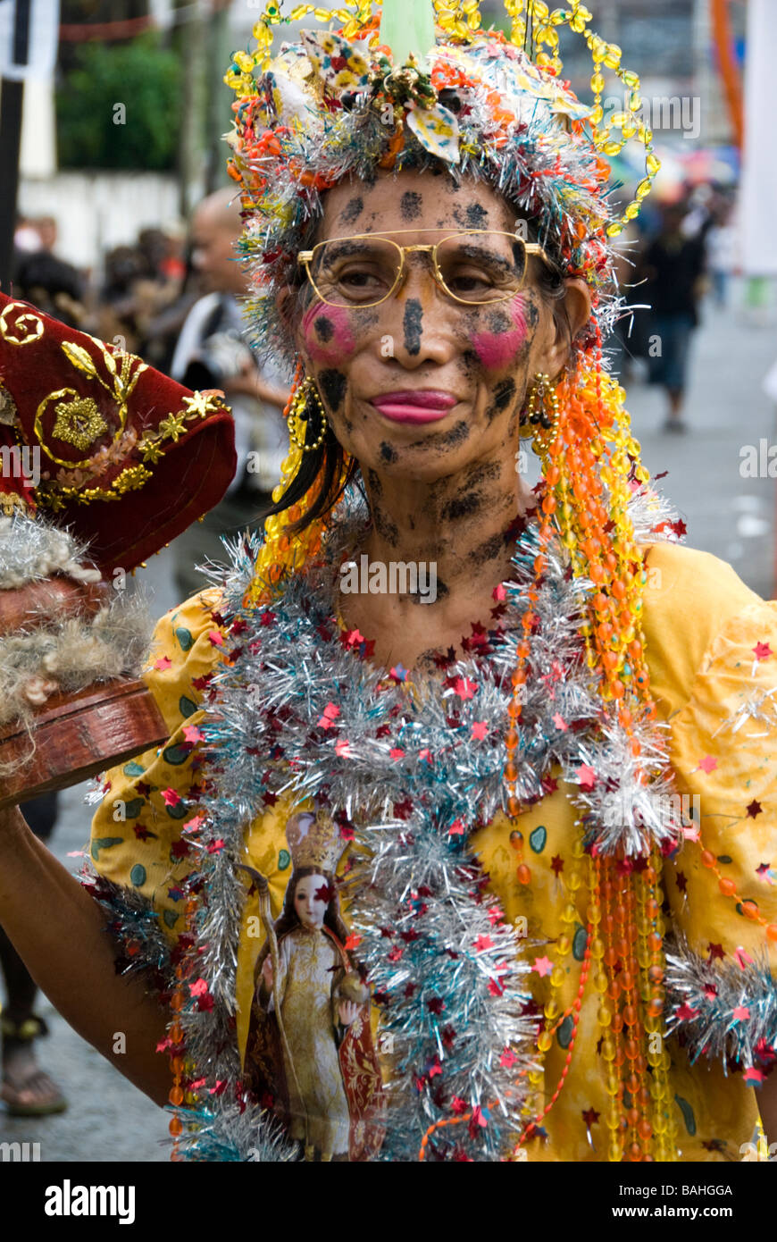 Filipina woman in sparkly costume at the Ati-Atihan festival in Kalibo, Philippines Stock Photo