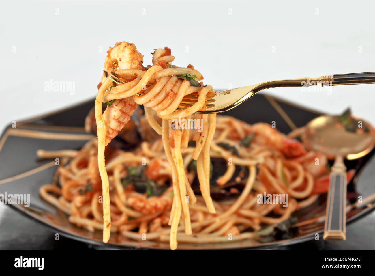 Spaghetti marinara pasta with seafood mussels prawns squid Stock Photo
