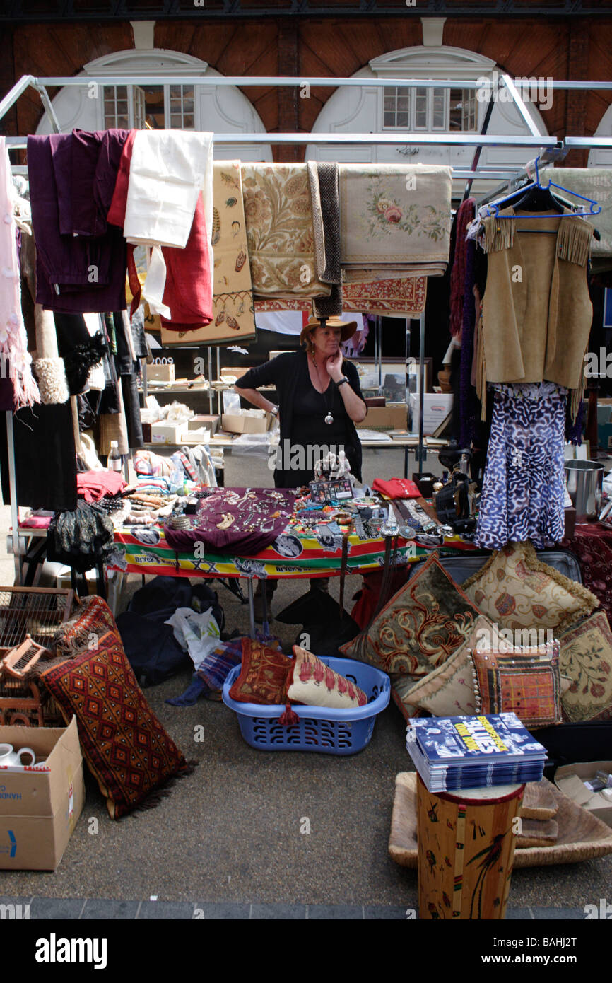 Clothes and rugs stall at Old Spitalfields Market London April 2009 ...