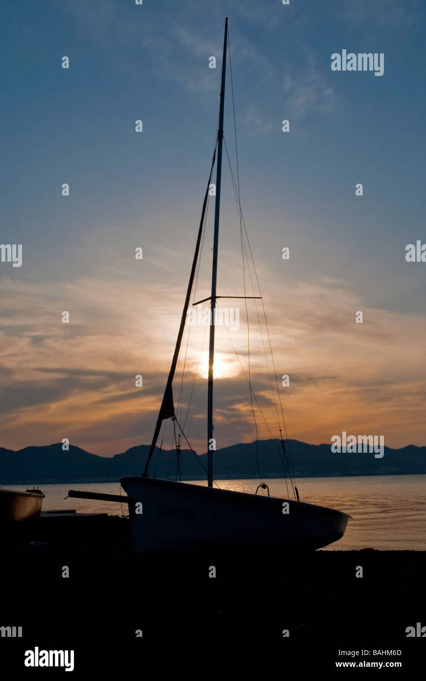 Sailing boat at sunset hi-res stock photography and images - Alamy