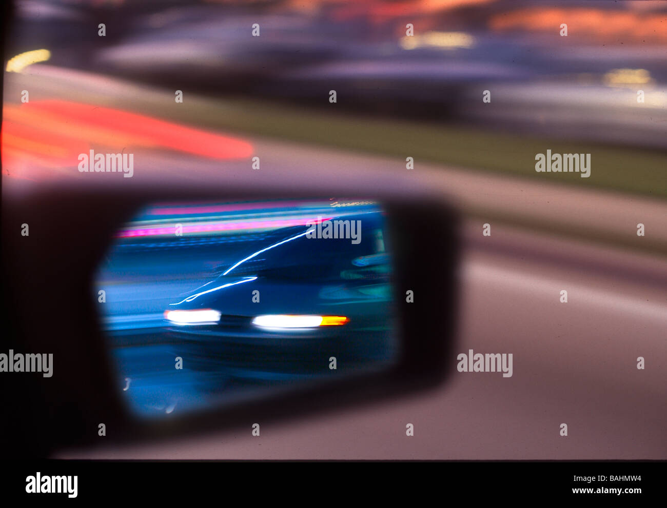 night traffic shown in rear view mirror Stock Photo Alamy
