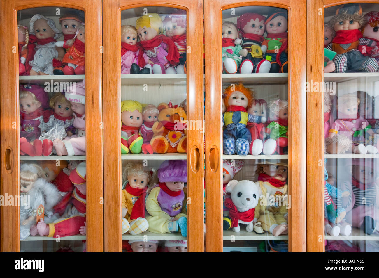 dolls and toys in a wardrobe in a native South Koreans house in China Stock Photo