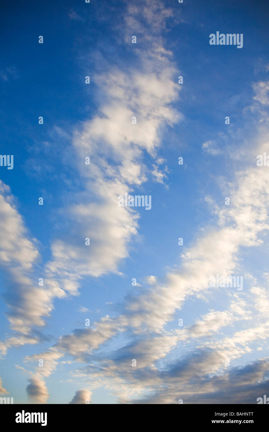 Altocumulus Cloud formation on a blue sky day Stock Photo