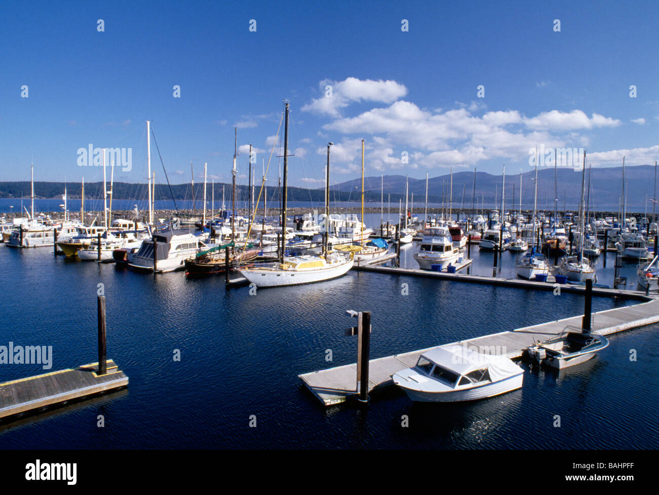 Boats moored at a marina at Discovery Bay Strait of Juan de Fuca Olympic Penninsula Washington USA Stock Photo