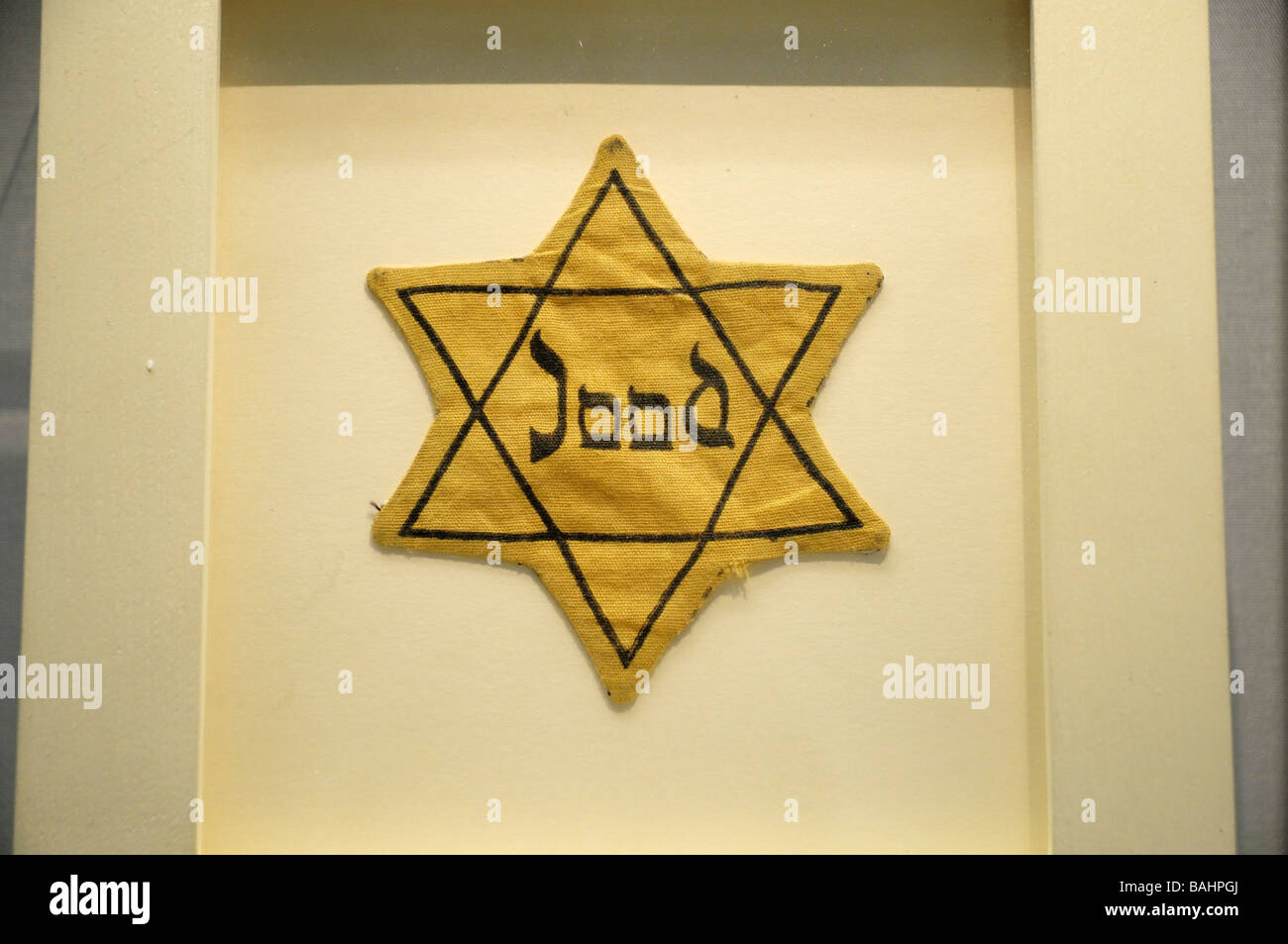 Yellow star for Dutch Jews, used by the nazis to identify Jews from Spring 1942. Stock Photo