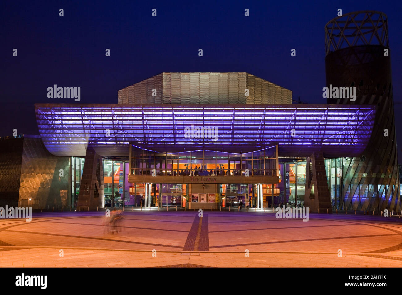 UK England Salford Quays Lowry Centre and Lyric Theatre entrance at night Stock Photo