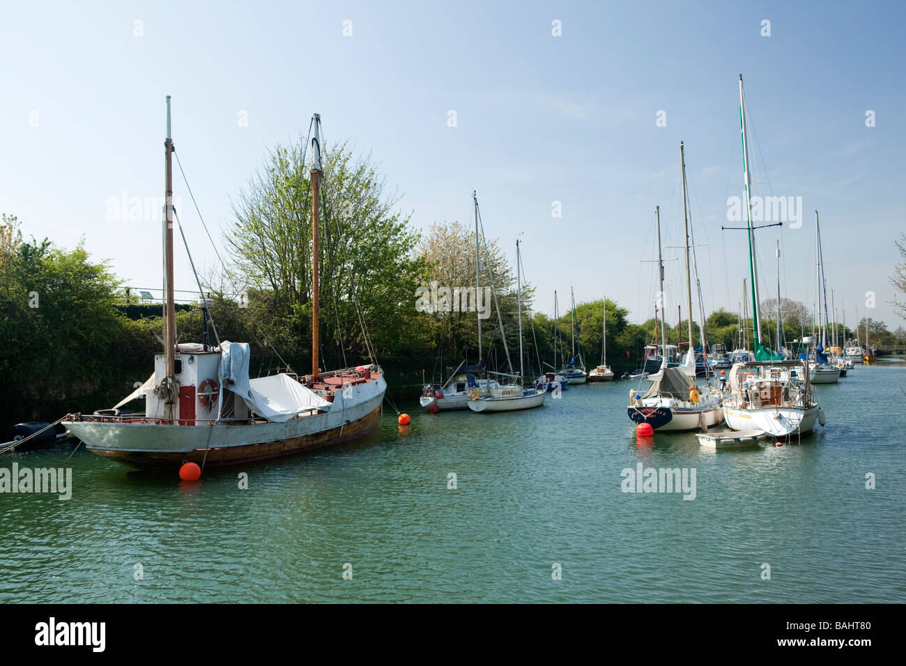 UK Gloucestershire Lydney Docks boats moored in newly restored River Lyd harbour Stock Photo