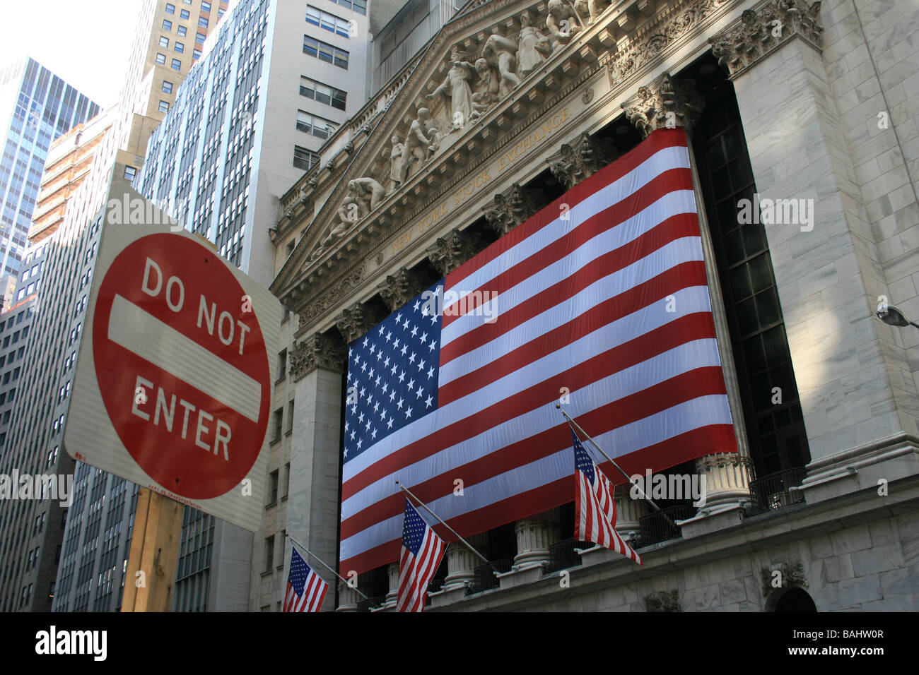 Sign outside the New York Stock Exchange. Stock Photo