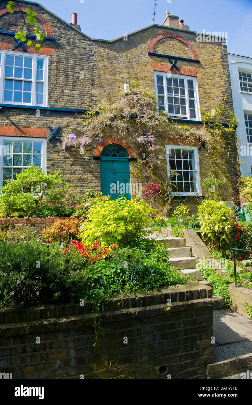 Spring in Hampstead Village , picturesque old cottage , terraced house