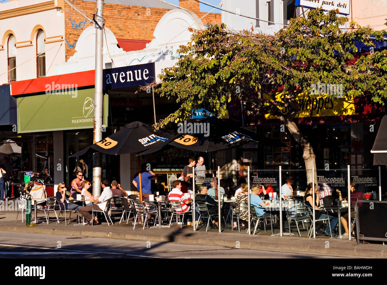 Melbourne Cafes and Restaurants / Diners enjoy eating Al fresco in the Suburban locality of Albert Park.Melbourne Australia. Stock Photo