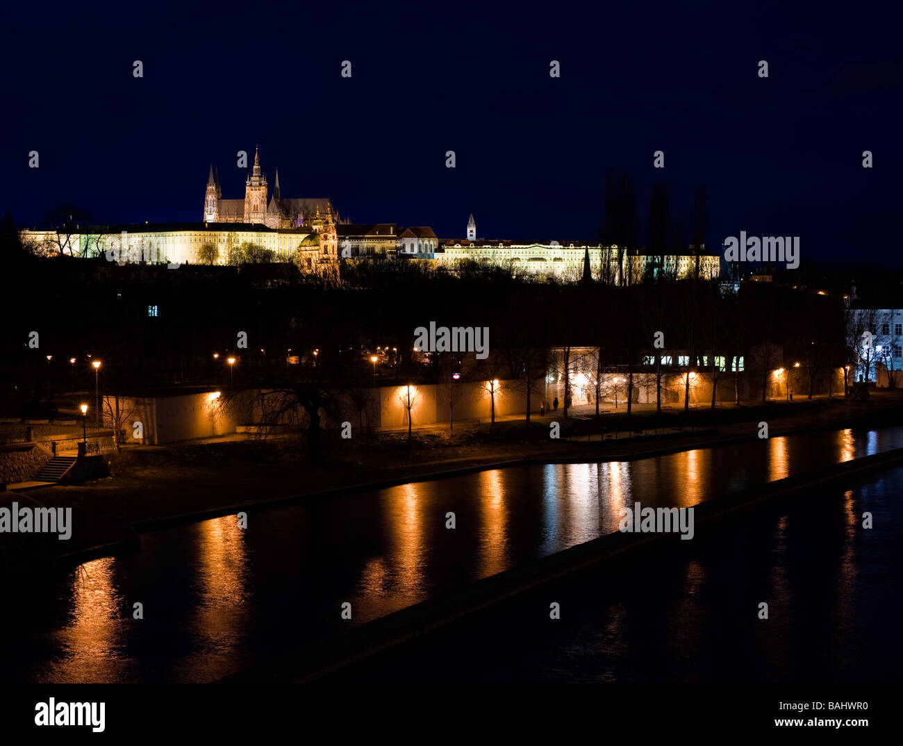night riverside in Prague Czech Republic with Palace on the hill Stock Photo