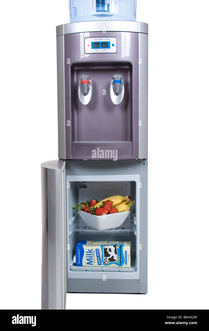 Water cooler with refrigerator section with fruit inside Stock Photo
