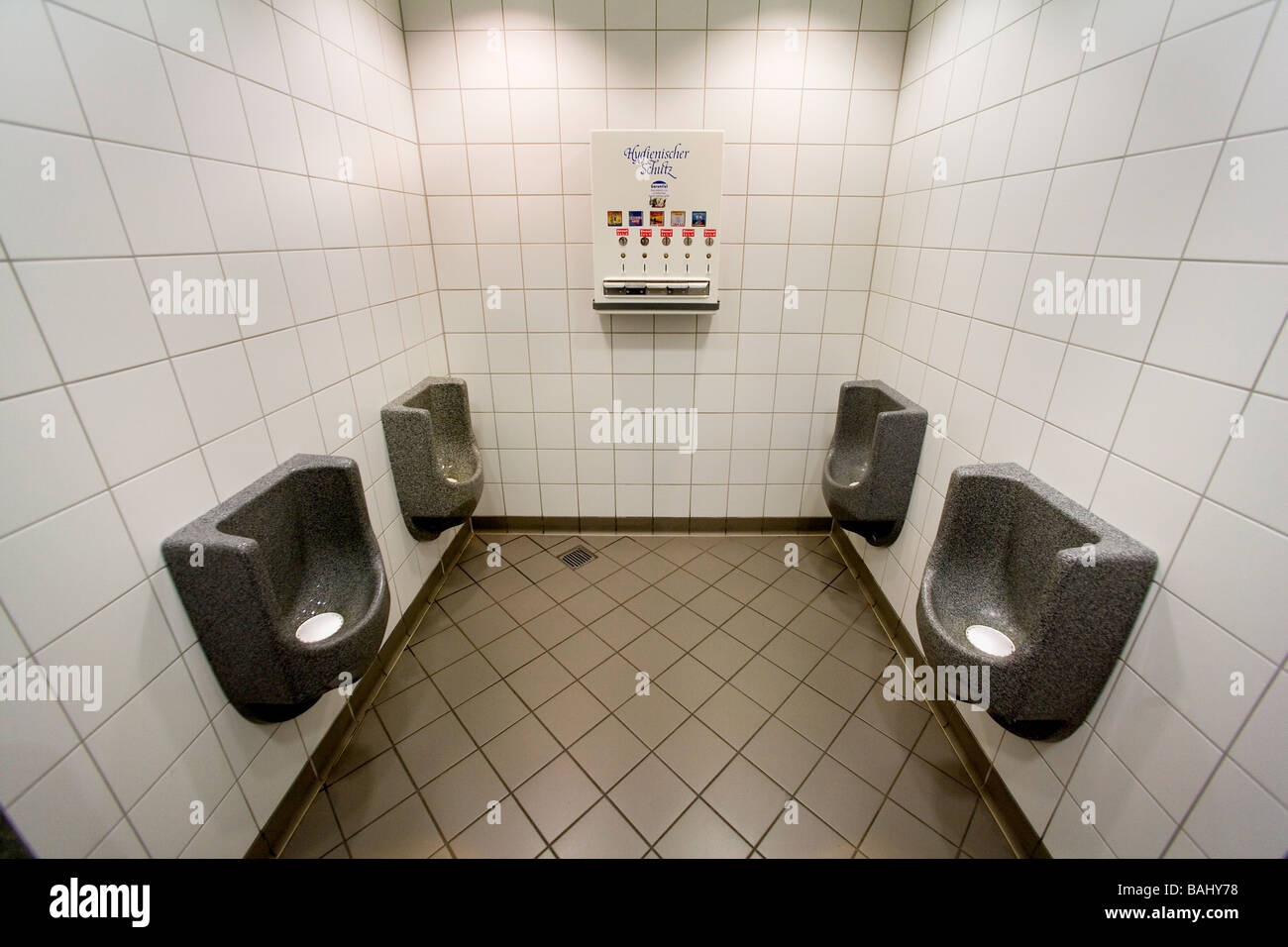Public toilet with condom vending machine Stock Photo Alamy