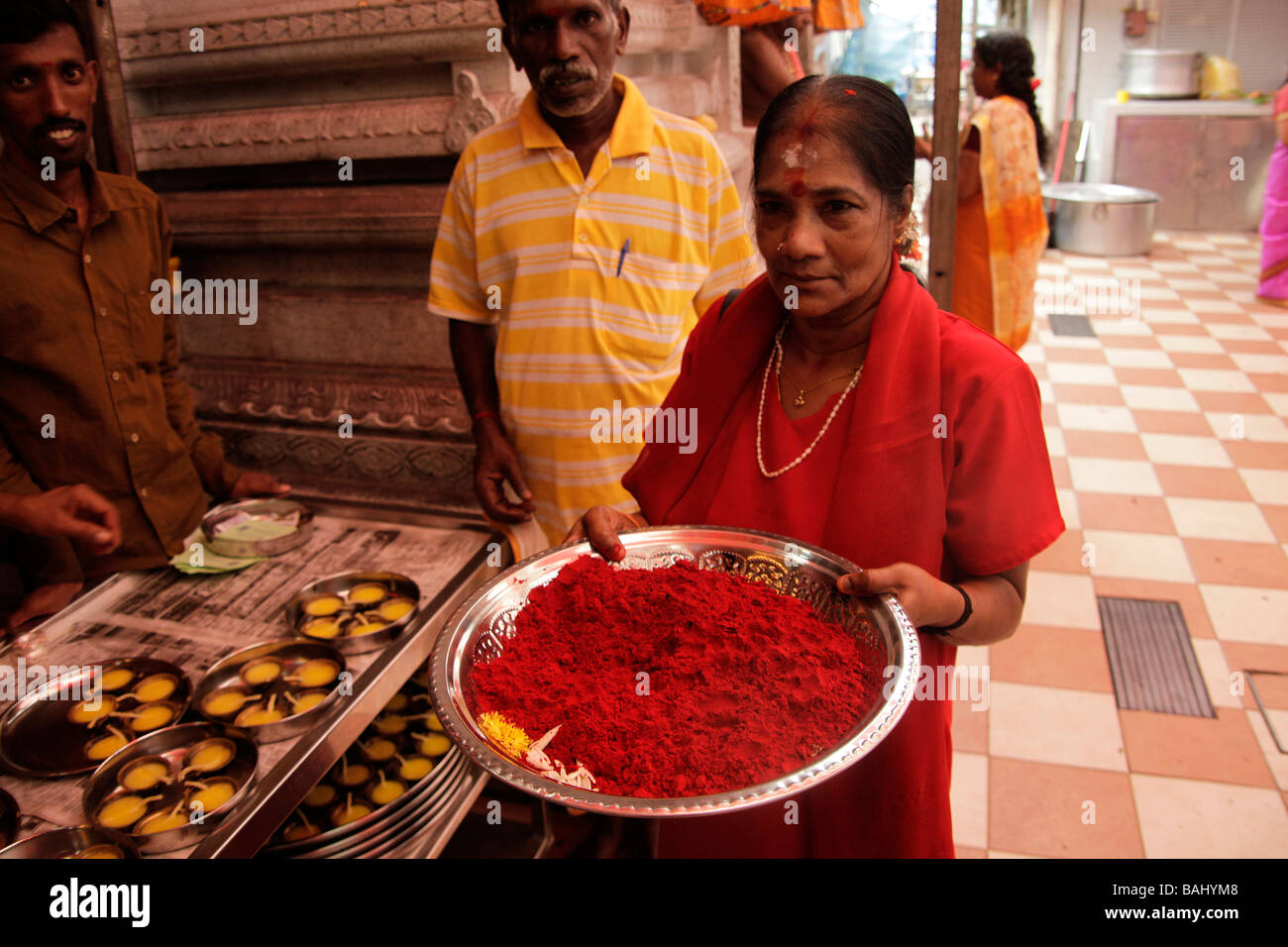 Hindu woman during a ceremony inside the Sri Veeramakali Aman temple in Singapore Asiatisch Asian Stock Photo