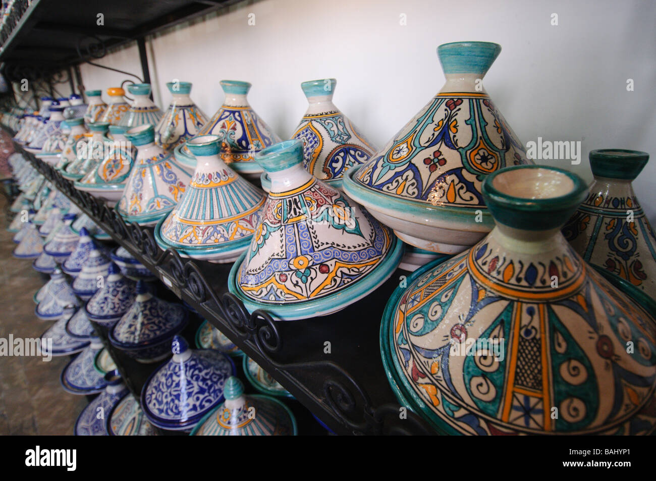 Tadjines and other ceramic artisan products for sale in a shop in the medina  of Fez Morocco Stock Photo - Alamy